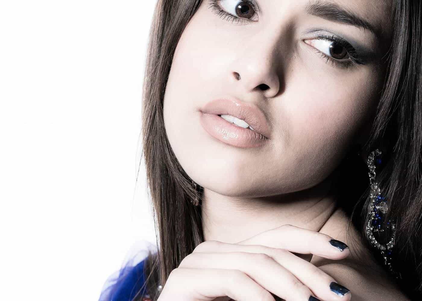 A model in a studio portrait session