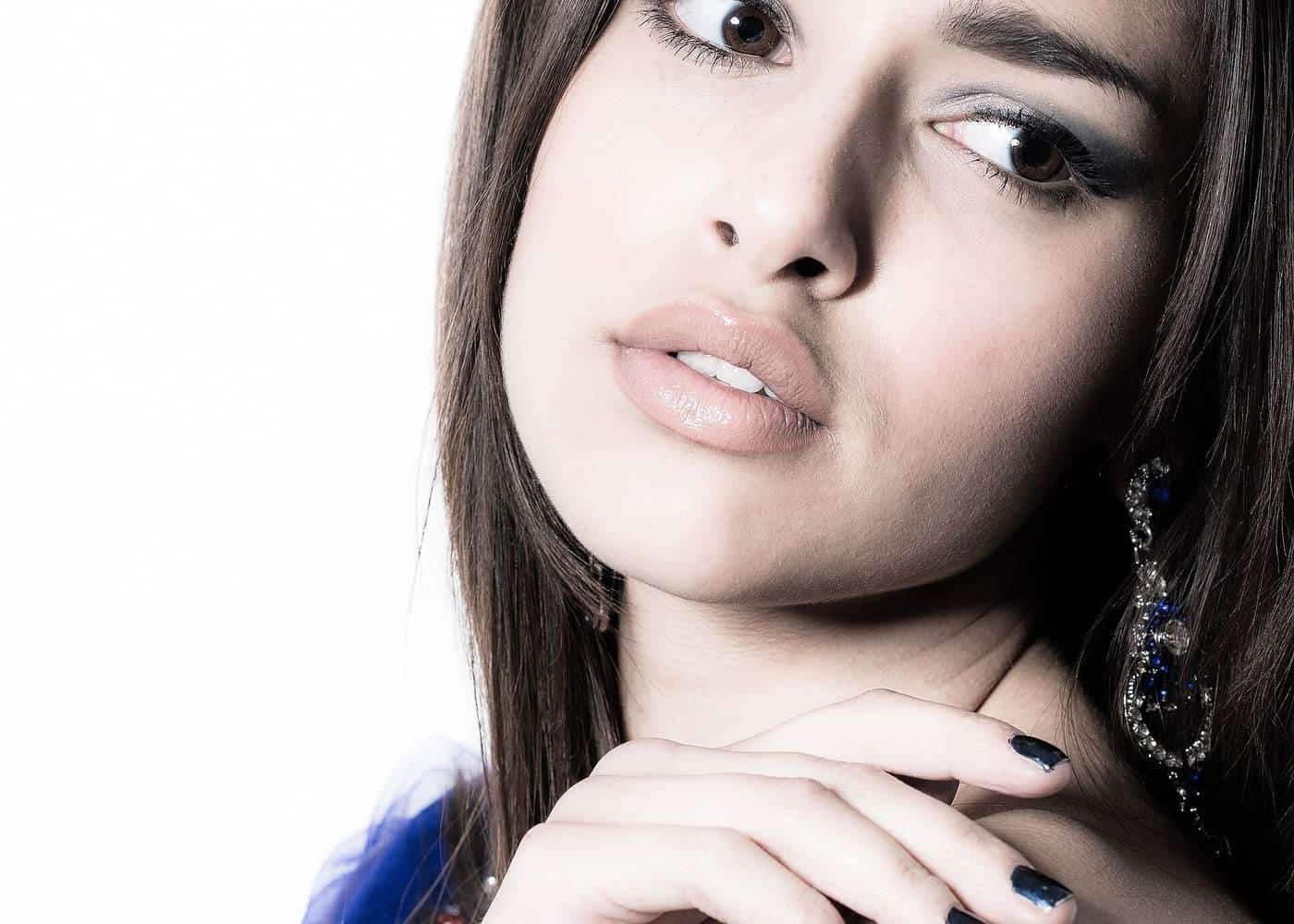 A model in a studio portrait session