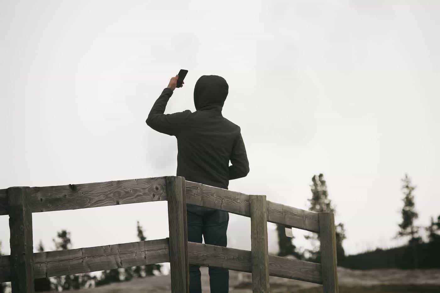 A man taking a selfie outdoors